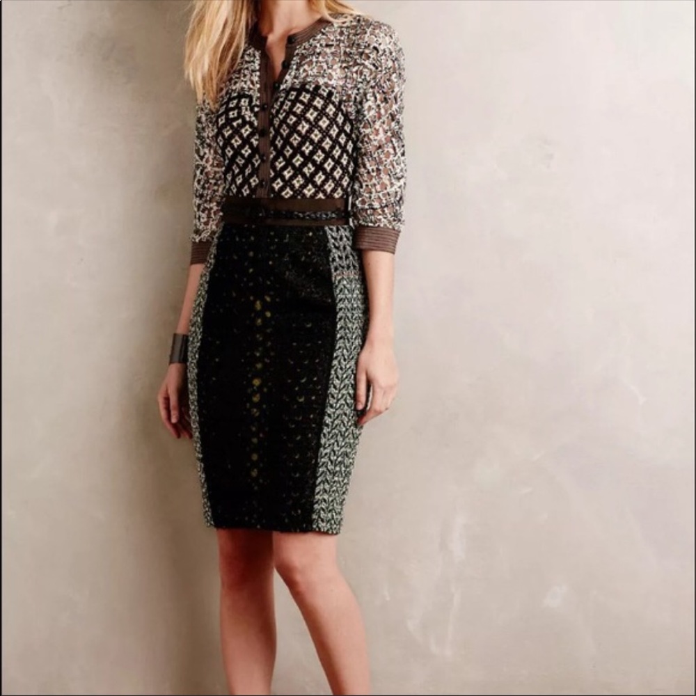 Byron lars medalist.  Great condition, worn once.